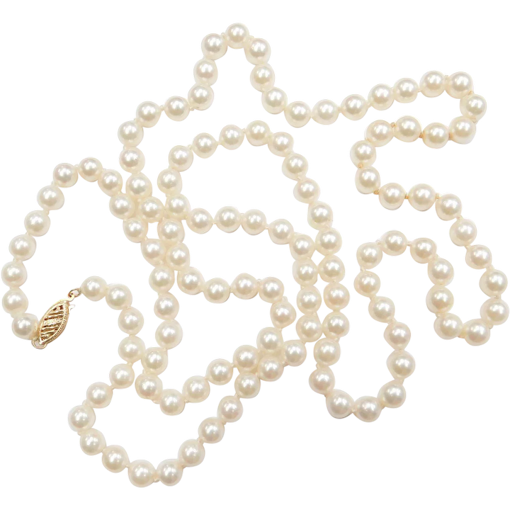 Elegant Long Cultured Pearl Strand with Filigree Clasp
