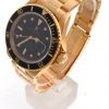side view Pre-Owned 1980 Yellow Gold Rolex Submariner 40MM Watch With Black Nipple Dial And Black Bezel With Oyster Band Model# 16808