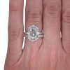 Emerald Diamond Baguette Halo Engagement Ring White Gold Worn
