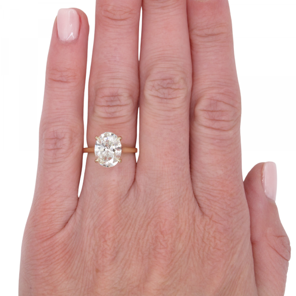 3 carat oval diamond engagement ring worn