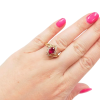 1.36ctw Oval Ruby Asymmetrical Ring 14K