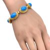 Persian Turquoise Cabochon Bracelet 18K Gold worn